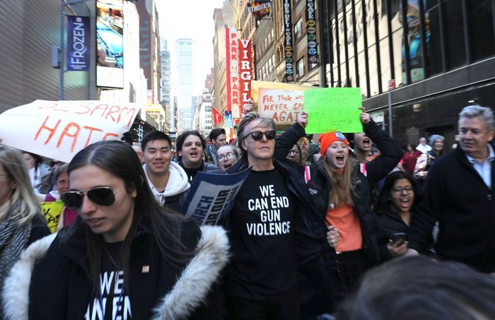 Paul McCartney marching in New York